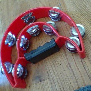 Red never used tamborine